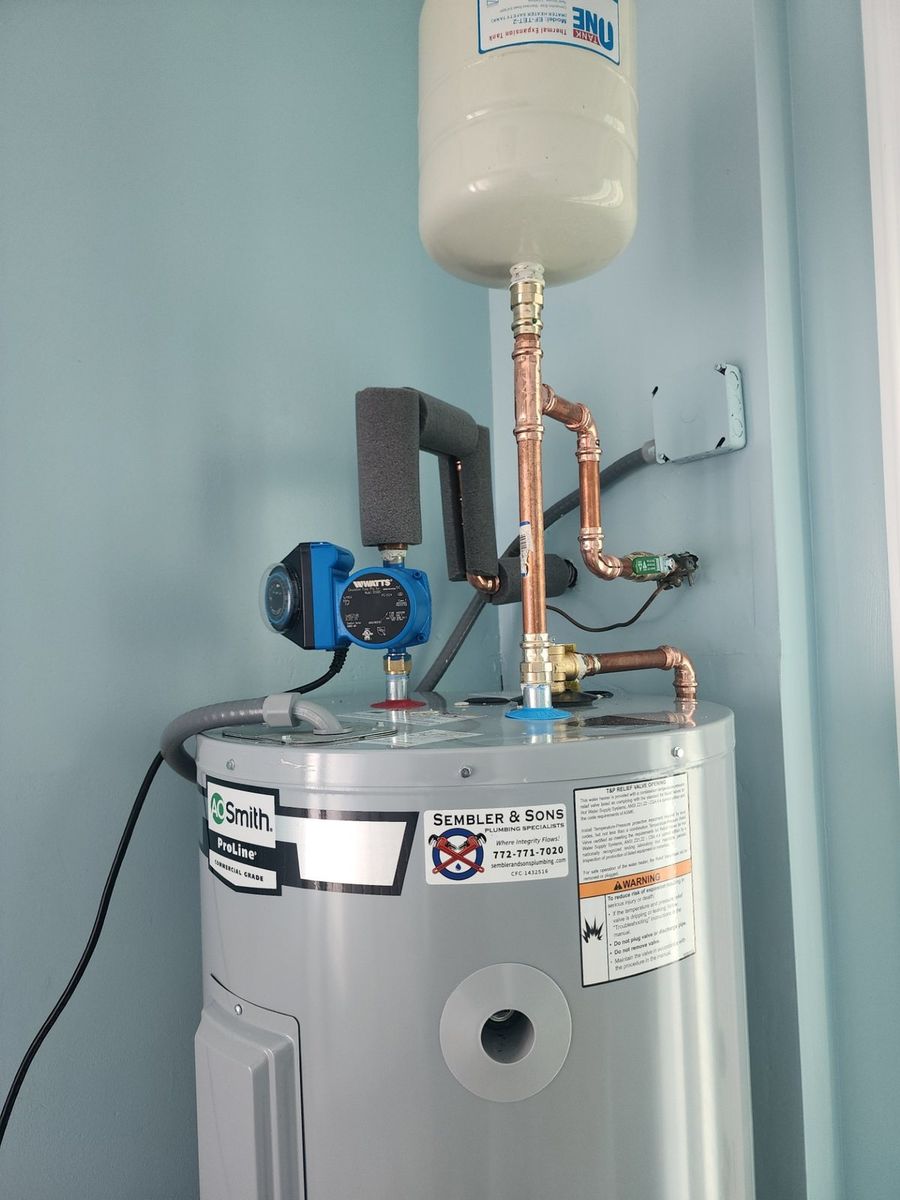 A.O. Smith ProLine tank water heater with a hot water recirculation pump and expansion tank